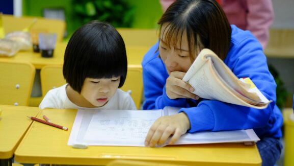 Child and teacher