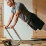 Man Practising Reformer Pilates